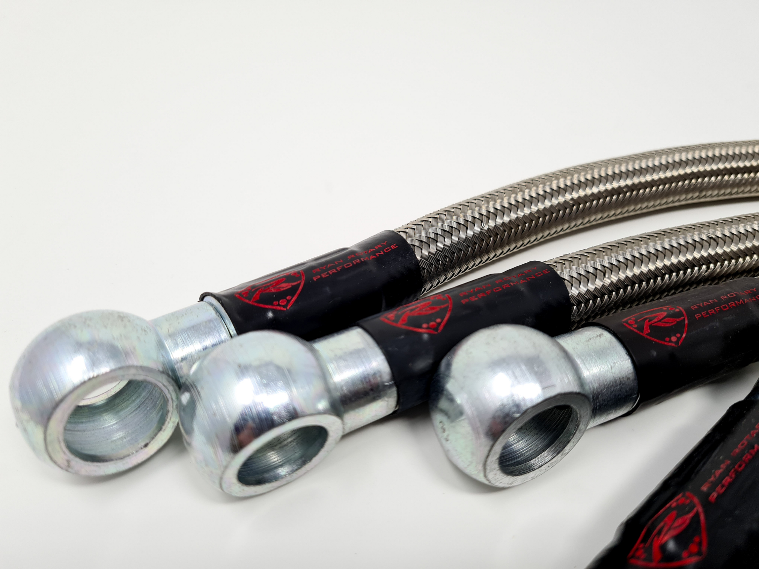 thumbnail image 2 of Rx7 FC 86-91 Oil Cooler Lines – Steel Braided W/ AN Fittings – Stu Kelly Motorsports 2 of 4
